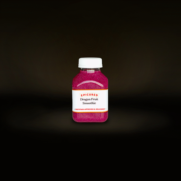 Refreshing Epicured Dragon Fruit Smoothie with a blend of berries, creamy coconut and hemp milk, sweetened with pure maple syrup, with a zing of ginger juice.